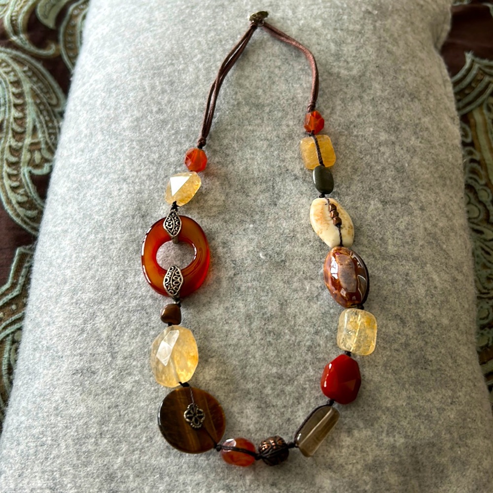 Silpada necklace. Taupe rust color with clear, mixed materials.